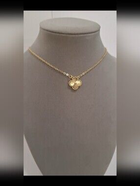 Double sided gold-filled single clover necklace.